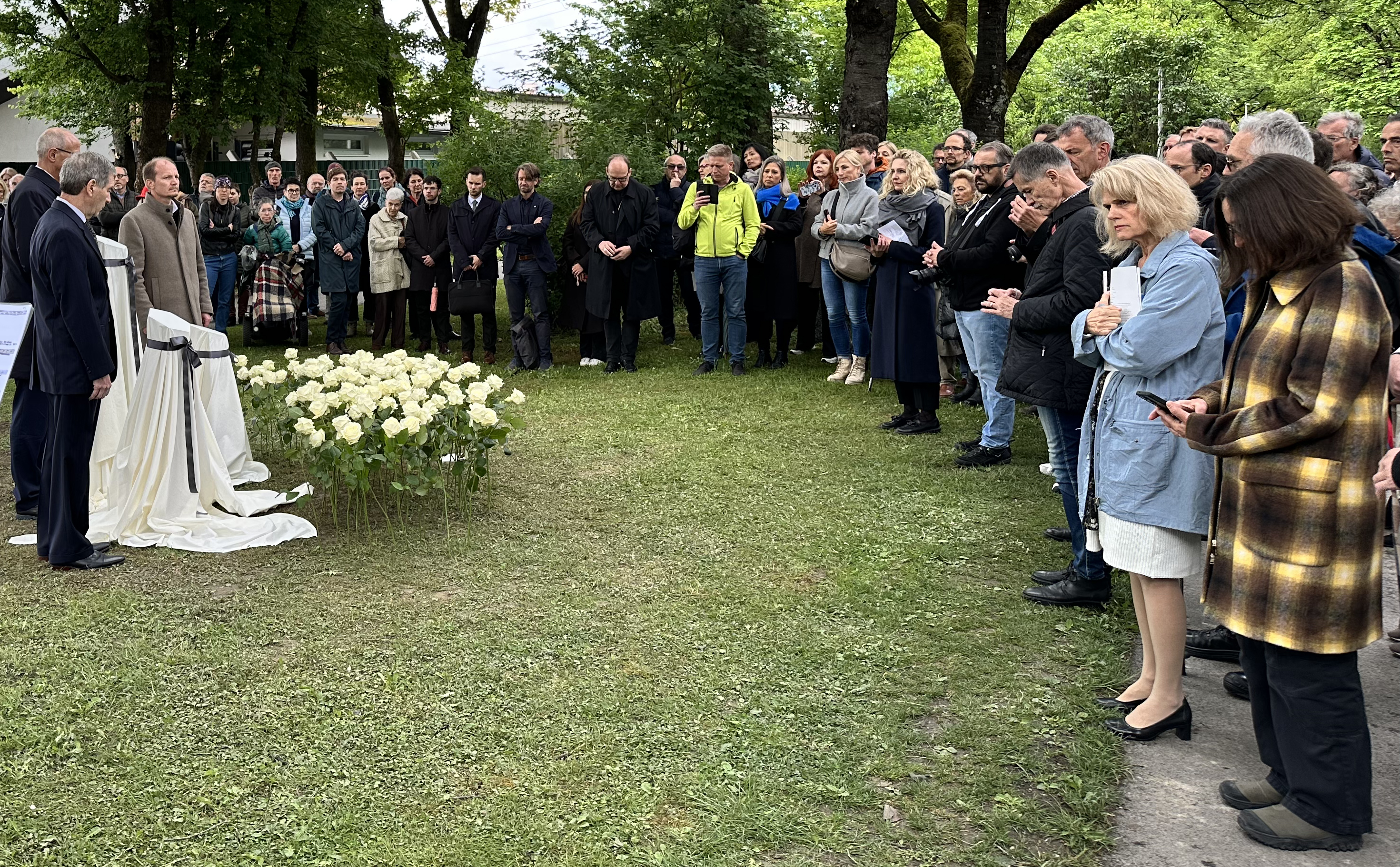 Groundbreaking ceremony on May 8, 2025, with Jeffrey Wisnicki, Governor Anton Mattle, and Mayor Johannes Anzengruber unveiling the first name stone prototypes